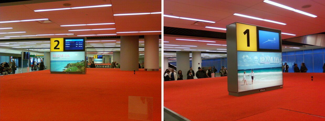 Bermuda luxury print campaign running on backlit airport panels beside the baggage-claim carousels