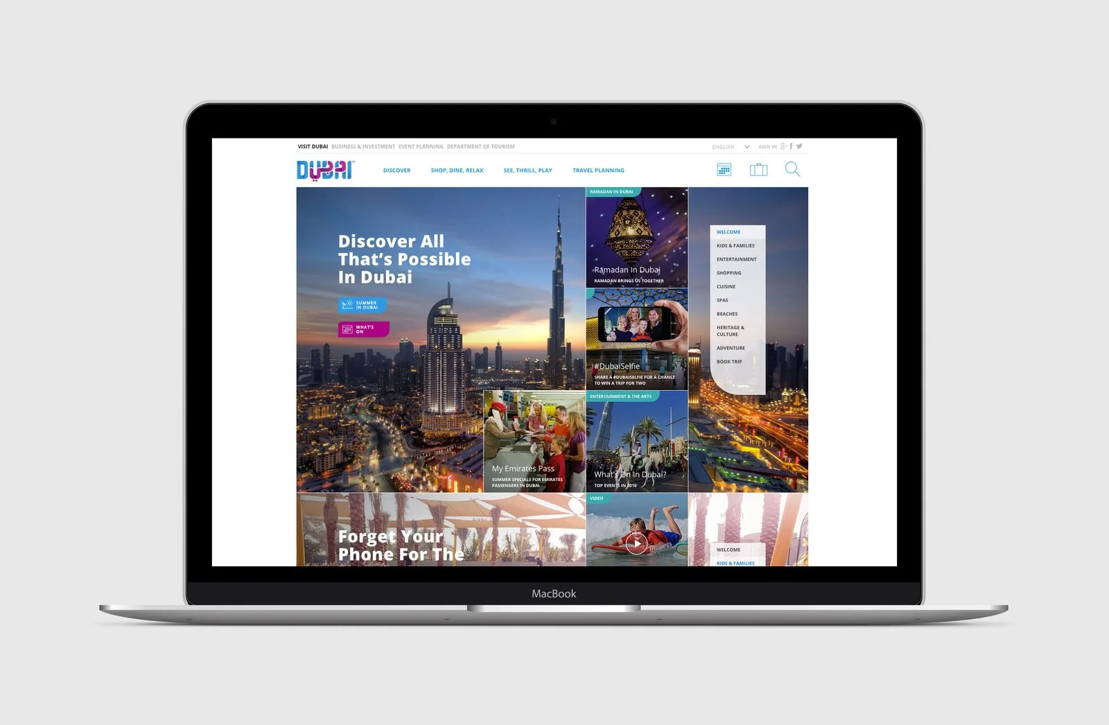 Dubai Tourism responsive site homepage on a MacBook with the headline Discover All That's Possible In Dubai