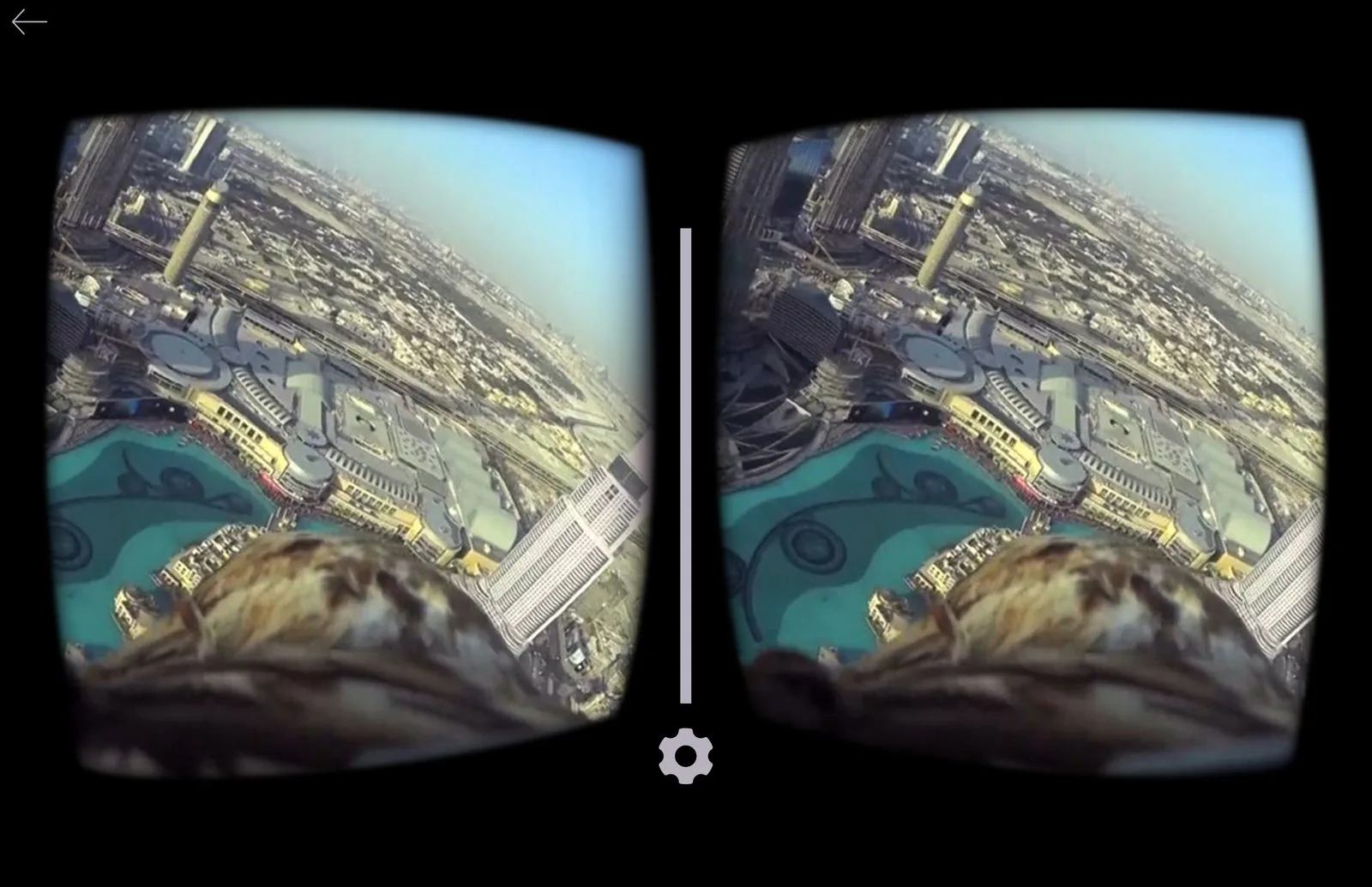 Stereoscopic Google Cardboard view from the falcon VR flight over downtown Dubai rooftops and turquoise water