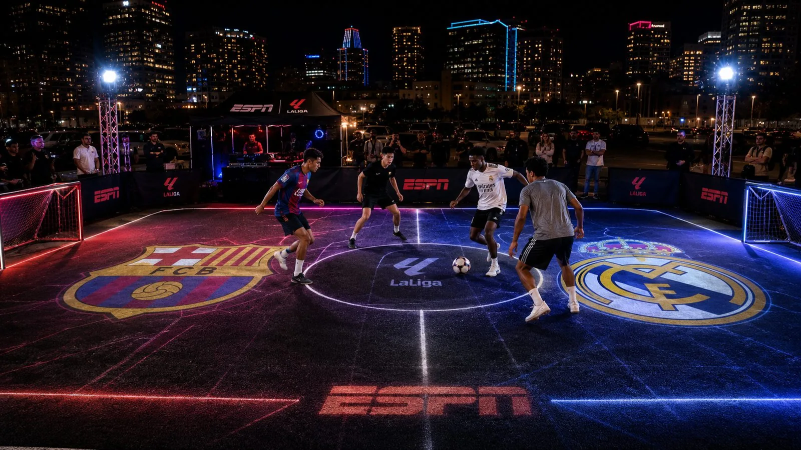 Pop-up ESPN x LaLiga street pitch at night with projected club crests on the court, part of the Rivalry Anywhere activation platform