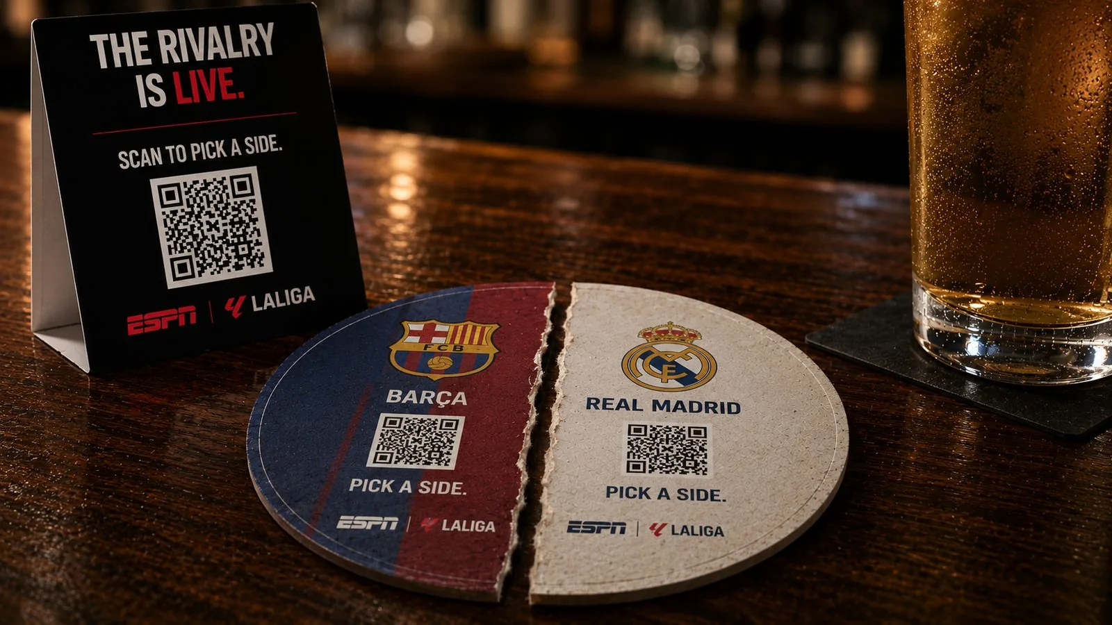 ESPN x LaLiga split bar coaster for FC Barcelona and Real Madrid with QR codes and a perforated dividing line fans can tear apart
