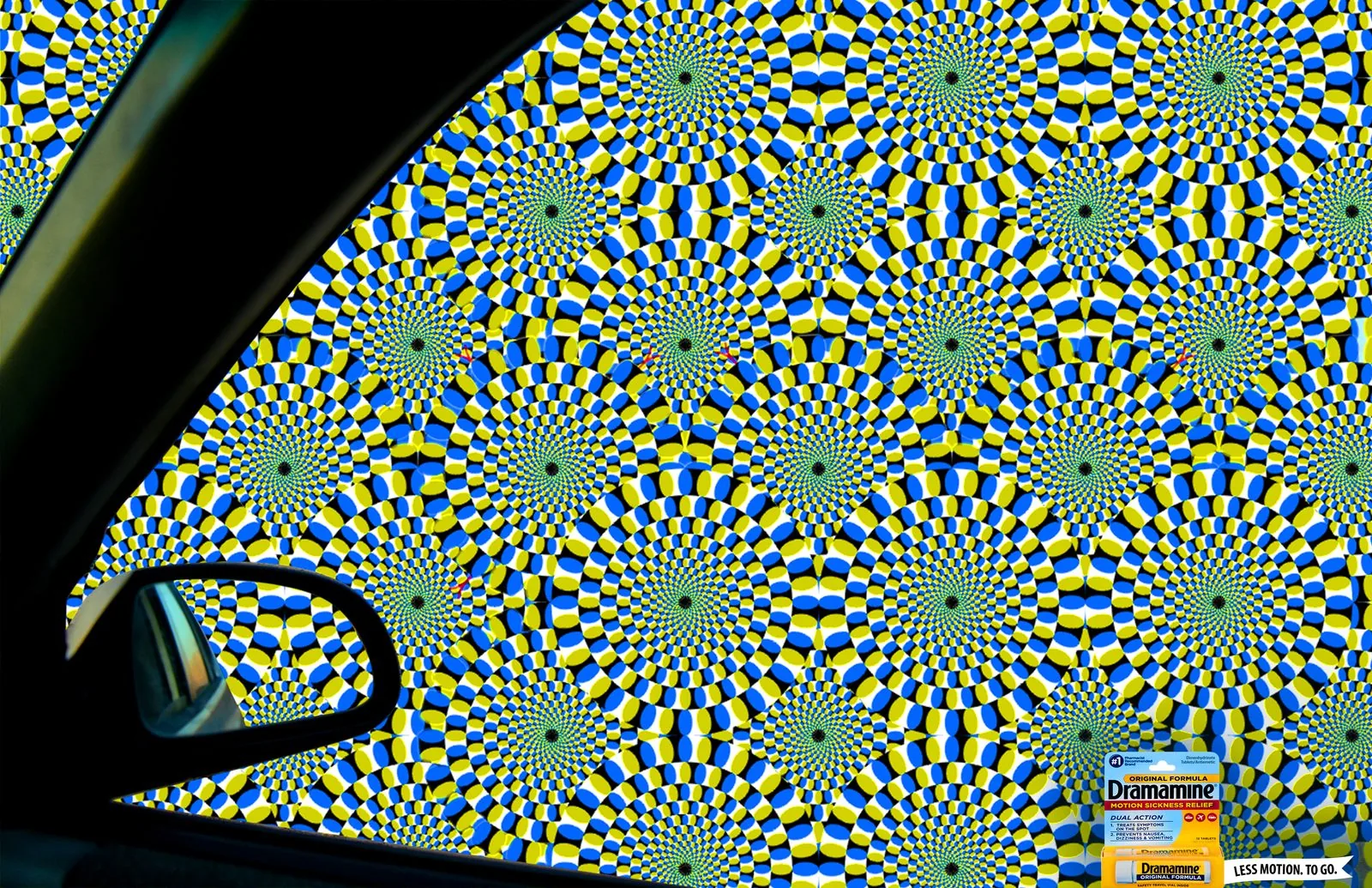 Dramamine print ad: whirling optical-illusion wheels fill the view from a car window and side mirror, with a Dramamine pack in the corner