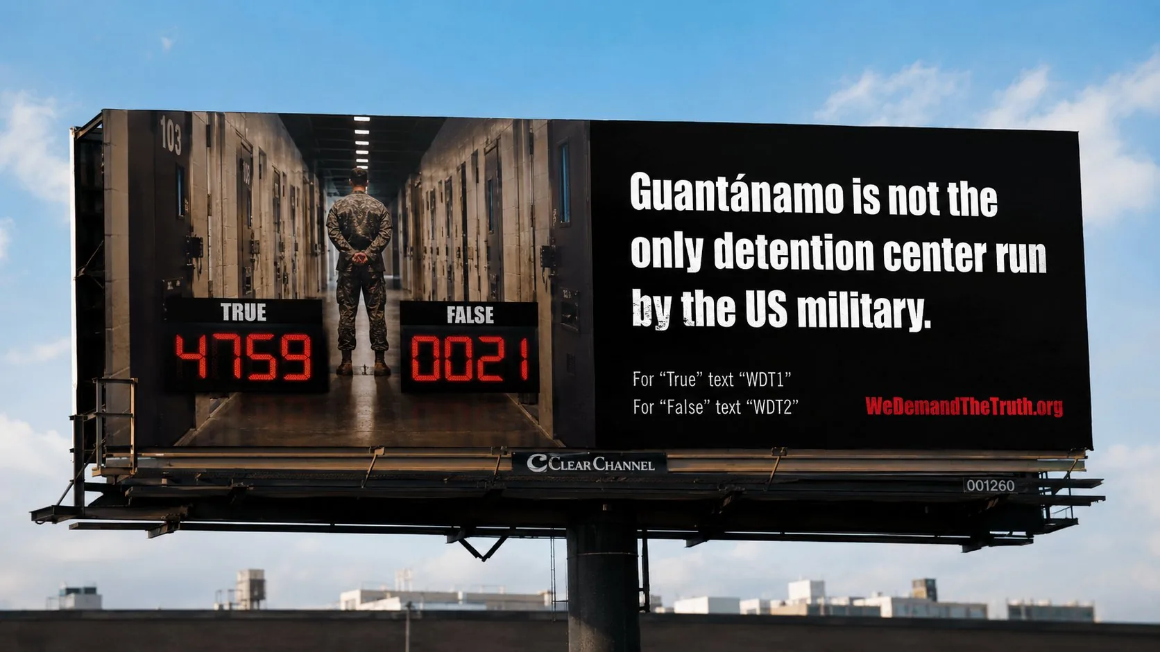 We Demand The Truth digital billboard: Guantanamo claim with a live true-or-false text-vote tally