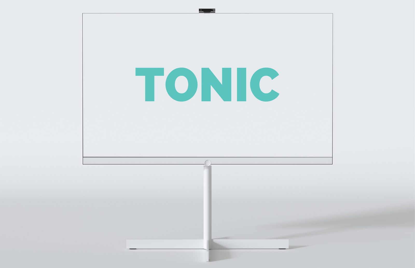 Camera-topped digital wayfinding display on a stand showing the teal TONIC wordmark on a white screen