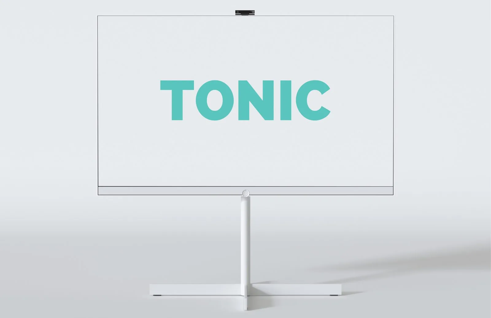 Camera-topped digital wayfinding display on a stand showing the teal TONIC wordmark on a white screen