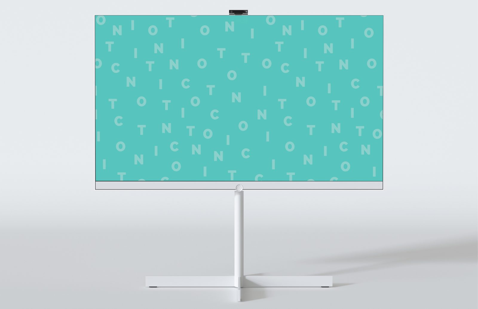 Digital wayfinding display filled edge to edge with the teal TONIC scattered letter pattern