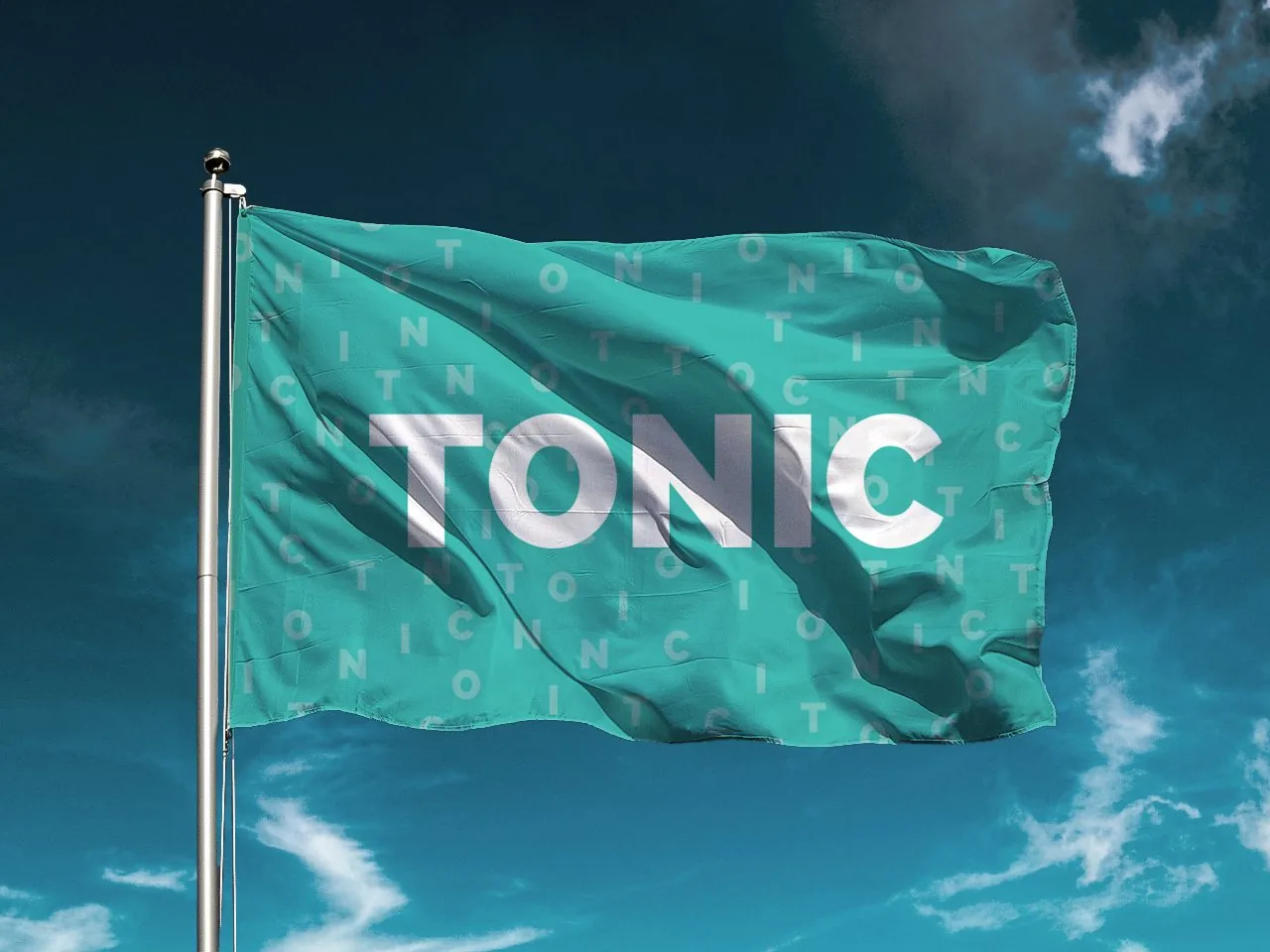 TONIC conference flag in surgical teal flying on a flagpole against a blue sky, wordmark set over a scattered letter pattern