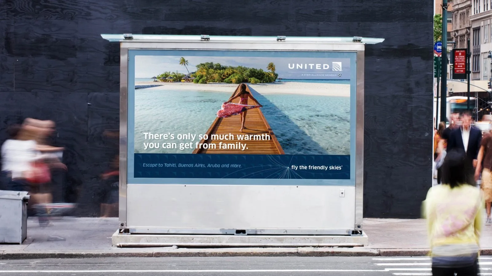 United Airlines bus shelter ad: There’s only so much warmth you can get from family