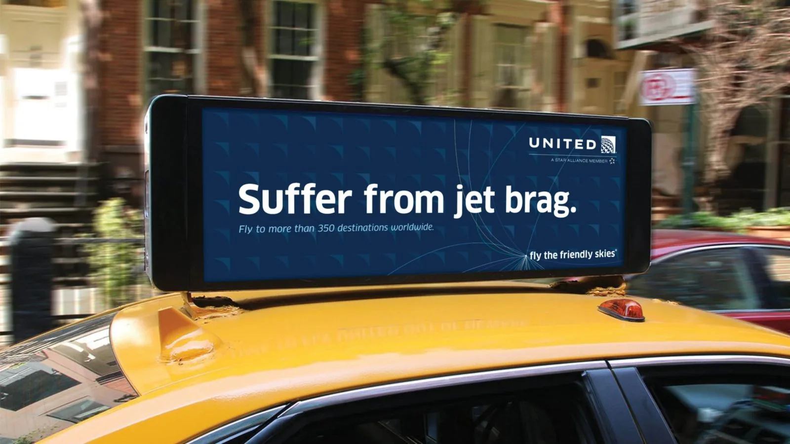 United Airlines taxi-top ad: Suffer from jet brag