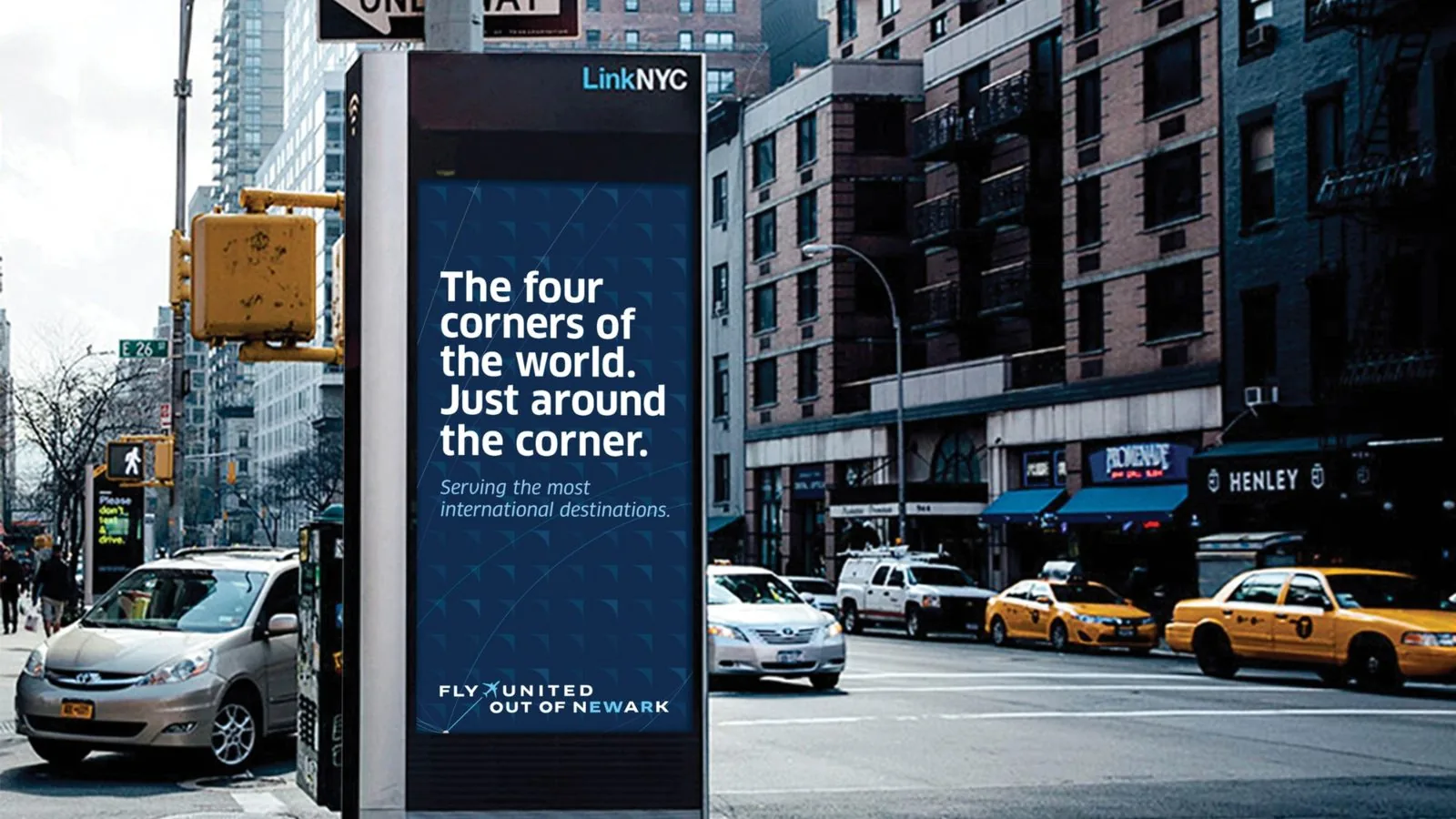 United Airlines LinkNYC kiosk ad: The four corners of the world, just around the corner